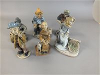 Lot 187 - Six Norman Underhill pottery figures