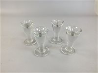 Lot 205 - A set of four deceptive drinking glasses