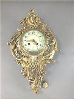 Lot 286 - A cast gilt metal cartel style wall clock