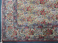 Lot 425 - A Kirman carpet