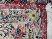 Lot 425 - A Kirman carpet