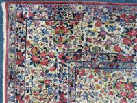 Lot 425 - A Kirman carpet