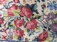 Lot 425 - A Kirman carpet