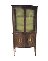 Lot 258 - An Edwardian mahogany and inlaid serpentine front display cabinet