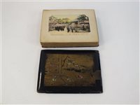 Lot 106 - A Lacquer bound album of Chinese and Japanese postcards