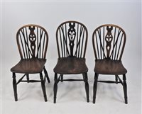 Lot 600 - A harlequin set of five elm and ash stick back single chairs (5)
