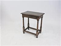 Lot 560 - A joined oak stool, 18th/19th century