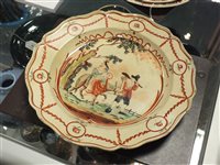 Lot 215 - Four Dutch decorated creamware plates, 18th century