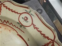 Lot 215 - Four Dutch decorated creamware plates, 18th century