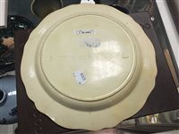 Lot 215 - Four Dutch decorated creamware plates, 18th century