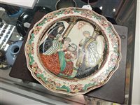 Lot 215 - Four Dutch decorated creamware plates, 18th century