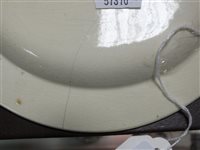 Lot 215 - Four Dutch decorated creamware plates, 18th century