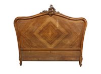 Lot 343 - A French walnut bed frame and sides