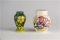 Lot 299 - A Moorcroft ginger jar in Magnolia and a vase in the Mandeville pattern