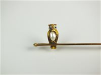 Lot 151 - An owl bar brooch