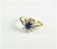 Lot 82 - Sapphire and diamond cluster ring