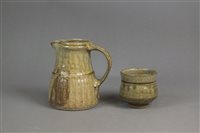 Lot 231 - A studio pottery jug and vase by Jim Malone