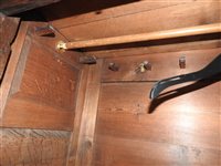 Lot 619 - A George III oak house keepers cupboard