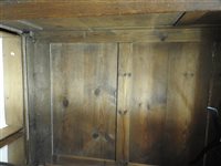 Lot 619 - A George III oak house keepers cupboard