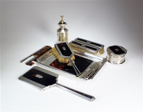 Lot 19 - A silver and tortoiseshell mounted dressing table set