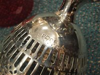 Lot 22 - A Victorian swing handled silver basket