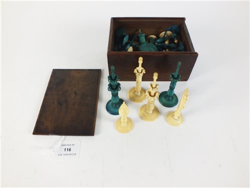 Lot 116 - A turned and stained ivory chess set, probably Persian
