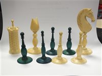Lot 116 - A turned and stained ivory chess set, probably Persian
