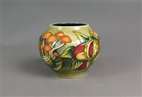 Lot 276 - A Moorcroft vase in the Mushrooms and Conkers pattern