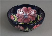 Lot 293 - Moorcroft bowl in the Anemone design against a blue ground