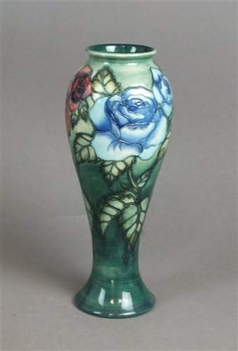 Lot 49 - A Moorcroft vase in the Rose and Bud pattern