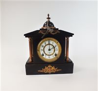 Lot 212 - A black marble mantel clock circa 1900 and a Japanese gun metal mantel clock