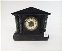 Lot 216 - Two black and variegated marble mantel clocks
