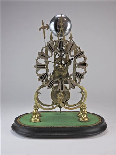 Lot 208 - A brass skeleton clock with triple steeple open frame and single fusee movement