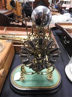 Lot 208 - A brass skeleton clock with triple steeple open frame and single fusee movement