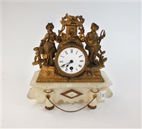 Lot 215 - A French gilt mantel clock