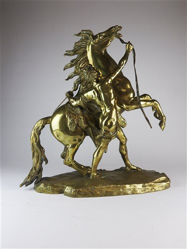 Lot 196 - A large brass Marly horse and trainer after Coustou, French, 19th century