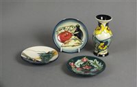 Lot 305 - Three Moorcroft pottery pin dishes and a vase in the Pansy Parade pattern