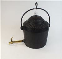 Lot 130 - A large cast iron and brass fireplace urn