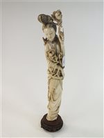 Lot 102 - A Large Chinese Ivory Figure of Guanyin