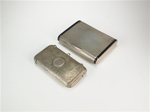 Lot 18 - A combined silver cigarette and vesta case