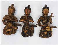 Lot 166 - A set of six Indian  carved giltwood musicians