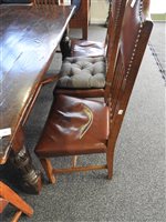 Lot 234 - A set of 8 (6+2) Arts and Crafts oak dining chairs