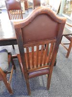 Lot 234 - A set of 8 (6+2) Arts and Crafts oak dining chairs