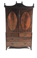Lot 596 - A George III mahogany linen press