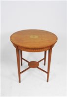Lot 578 - An Edwardian satinwood and inlaid centre table