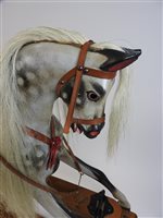 Lot 499 - A dappled grey rocking horse