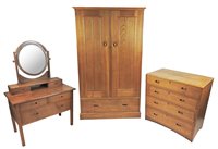 Lot 621 - An Arts & Crafts three piece chestnut bedroom suite