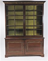 Lot 568 - Mahogany and parcel gilt cabinet bookcase