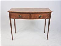 Lot 611 - A bow front satinwood side table early 19th century