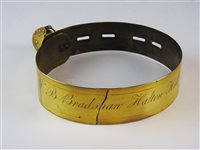 Lot 478 - A brass dog collar, 19th century and padlock